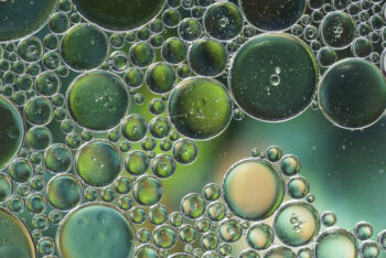 Dark green different abstract bubbles texture, from freepik